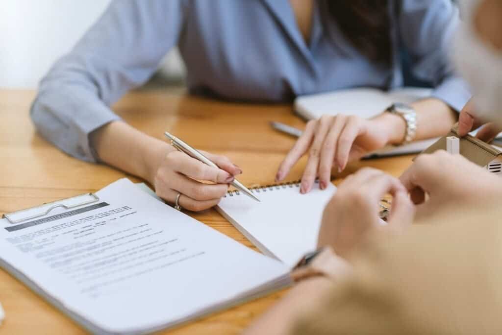 female insurance agents are offering insurance to customer